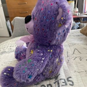 Purple Bear with colorful sparkles